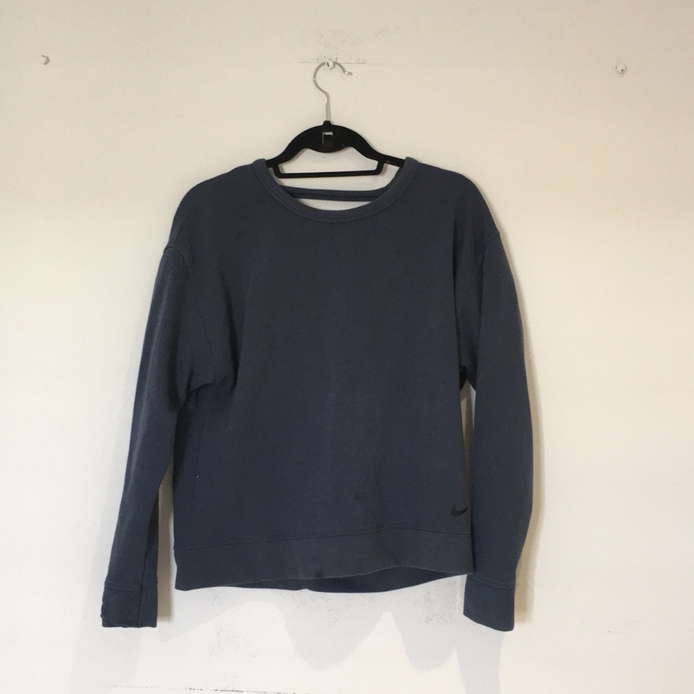 A blue sweater